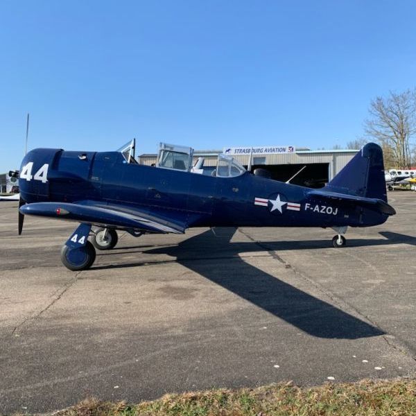 1951 Harvard Mk IV military airplane for sale on AvPay, by Strasbourg Aviation. View from the left