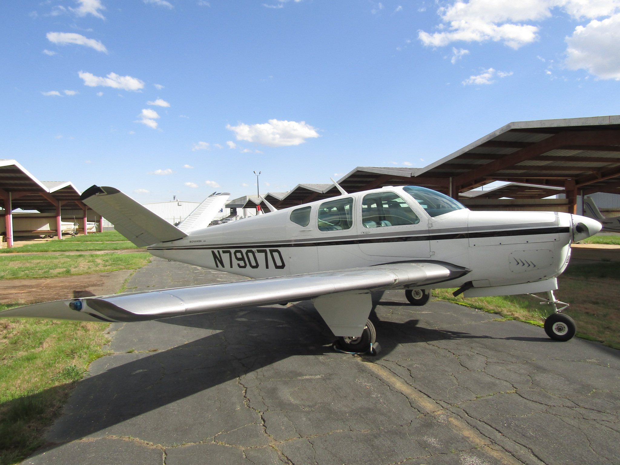 1957 Beechcraft Bonanza H35 Single Engine Piston Airplane For Sale (N7907D) From Carolina Aircraft On AvPay aircraft exterior front right close