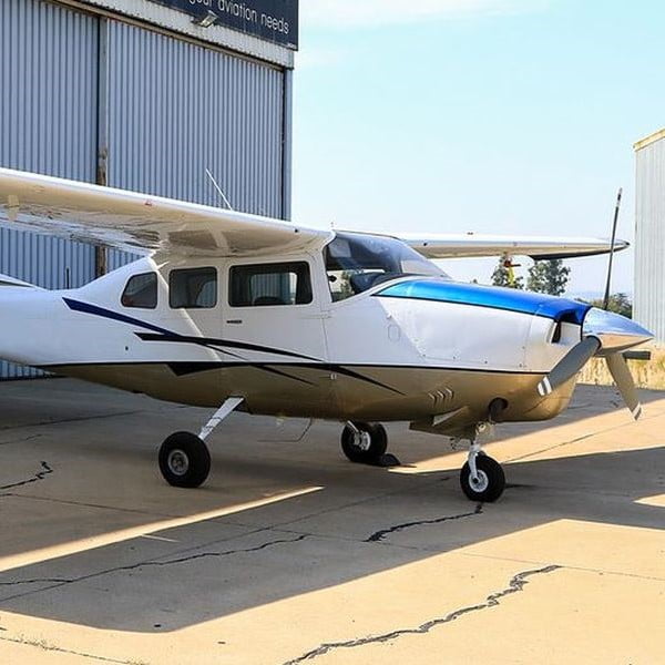1968 CESSNA T210 Single Piston Aircraft For Sale side view of plane