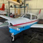 1978 Piper PA28R 201T Single Engine Piston Aircraft For Sale From Aeromeccanica on AvPayv front left of aircraft hangered