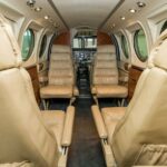 1979 Beechcraft King Air C90 turboprop airplane for sale on AvPay by Jetron. INterior facing forward