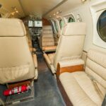1979 Beechcraft King Air C90 turboprop airplane for sale on AvPay by Jetron. Rear section of interior