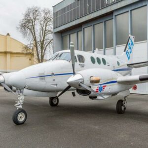 1979 Beechcraft King Air C90 turboprop airplane for sale on AvPay by Jetron. View from the left