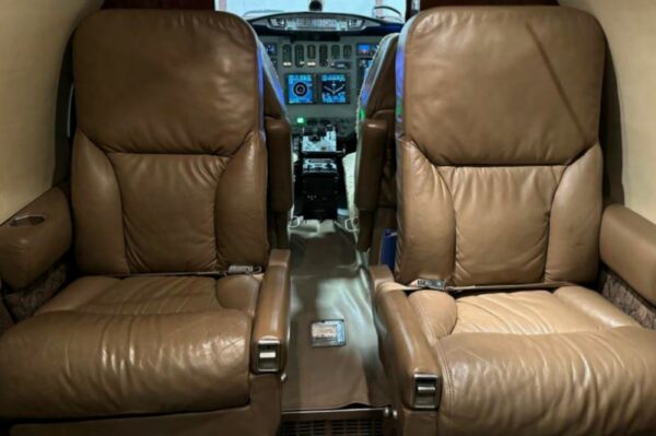 1980 Cessna Citation II (N676CM) Private Jet For Sale From Omnijet on AvPay aircraft interior at front passenger seats