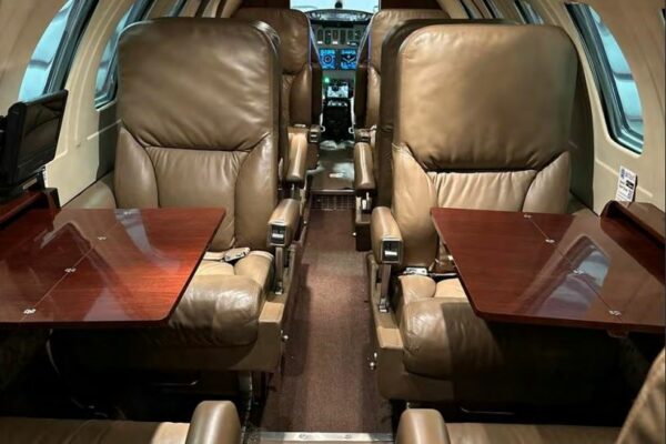 1980 Cessna Citation II (N676CM) Private Jet For Sale From Omnijet on AvPay aircraft interior to front passenger seats and tables