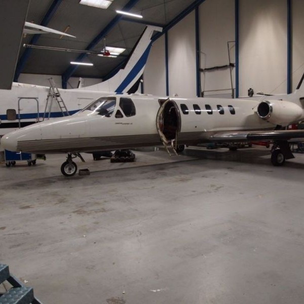 1981 Cessna Citation II private jet for sale on AvPay by Ascend Aviation. Parked in the hangar