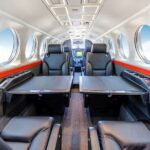 1997 Beechcraft King Air 350 Turboprop AIrcraft For Sale From jetAVIVA aircraft interior to cockpit with tables
