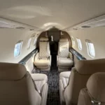 2002 Learjet 45 For Sale In Texas USA (N454MF) From Dyer Jet On AvPay aircraft interior mid cabin looking aft