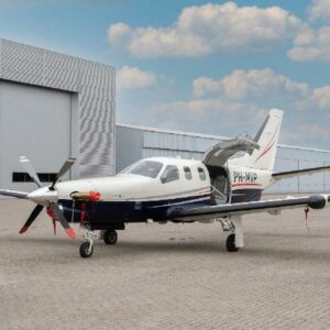 2004 SOCATA TBM 700C2 for sale by Flying Smart. Parked outside the hangar
