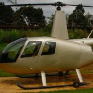 2005 Robinson R44 II Piston Helicopter For Sale stationary on helipad