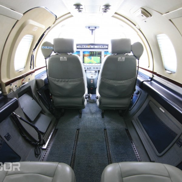 2007 Eclipse 500 Private Jet For Sale by Aerocor. Interior facing forward-min