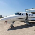 2008 Cessna Citation XLS+ for sale on AvPay, by Jetron. Parked in front of the hangar