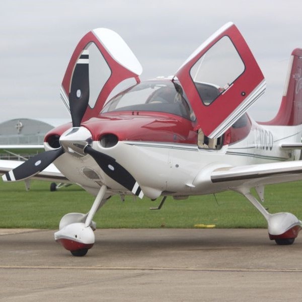 2009 CIRRUS SR22TN GTS G3 FIKI for sale by CK Aviation. Aircraft parked with canopies open-min