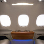 2009 EMBRAER PHENOM 100 (N80EJ) Private Jet For Sale on AvPay by Lone Mountain Aircraft. Table folded away