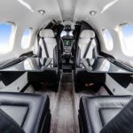2010 Embraer Phenom 100 Jet Aircraft For Sale From jetAVIVA On AvPay cabin interior to cockpit