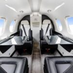 2010 Embraer Phenom 100 Jet Aircraft For Sale From jetAVIVA On AvPay cabin interior to rear