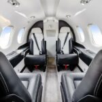 2010 Embraer Phenom 100 Jet Aircraft For Sale From jetAVIVA On AvPay cabin interior to rear no tables