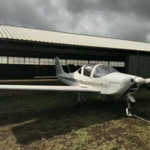 2010 Tecnam P2002 Sierra RG Single Engine Piston Aircraft For Sale (I-A266) From Ferryair Italy Aviation Service On AvPay aircraft exterior front right at hangar