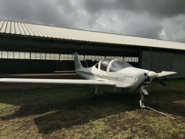 2010 Tecnam P2002 Sierra RG Single Engine Piston Aircraft For Sale (I-A266) From Ferryair Italy Aviation Service On AvPay aircraft exterior front right at hangar