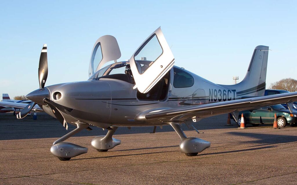 2013 Cirrus SR22T GTS G5 FIKI Single Engine Piston Airplane (N936CT) For Sale From CK Aviation On AvPay aircraft exterior front left doors open