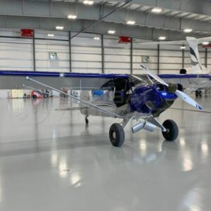 2014 Carbon Cub for sale by Global Aircraft. Parked in the hangar-min