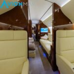 2016 Dassault Falcon 7X for sale by AvionMar. Aft interior looking forward