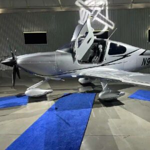 2022 CIRRUS SR22T G6 GTS for sale on AvPay by Lone Mountain Aircraft. Blue carpet in the hangar