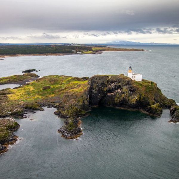 Aerial Photography From STB COPTER on AvPay over remote island and lighthouse
