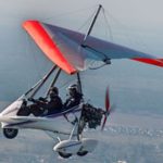 Aeros 2 Trike in flight over countryside