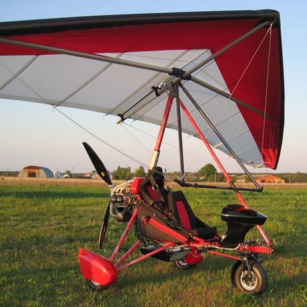 Aeros Cross Country Trike stationary in field front right