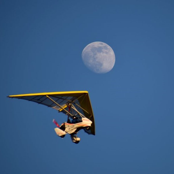 Aeros glider passing the moon