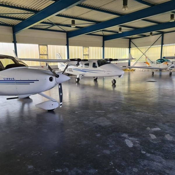 Aviation Sales International planes inside hanger