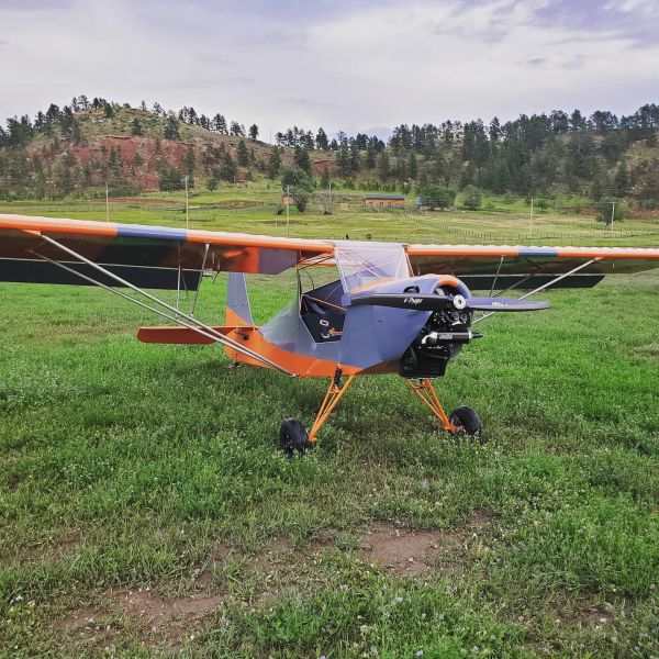 Badland Aircraft on AvPay. Parked in a field