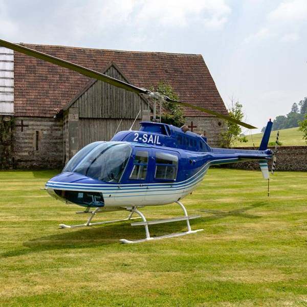 Bell 206B Jetranger for sale on AvPay by Europlane Sales. Parked on the grass