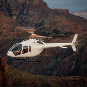 Bell 505 Jet Ranger X for sale by HelixAv. Flying over the mountains-min