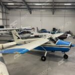 Bolkow 208C for sale on AvPay, by AT Aviation. Parked in the hangar