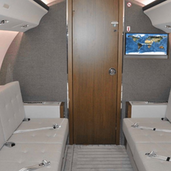 Bombardier Global 6000 for charter with AvconJet. Divans