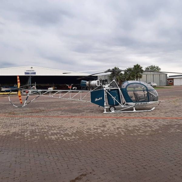 CT Aviation helicopter parked on the pan-min