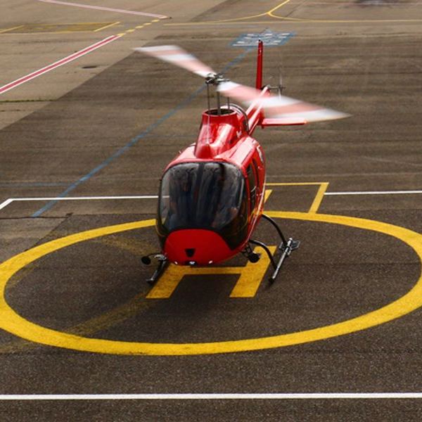 Centaurium Aviation Ltd on AvPay helicopter on helipad