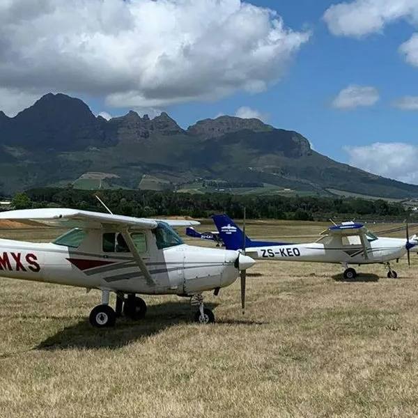 Cessna 152 For Hire at Algoa Flying Club in Port Elizabeth two planes on grass
