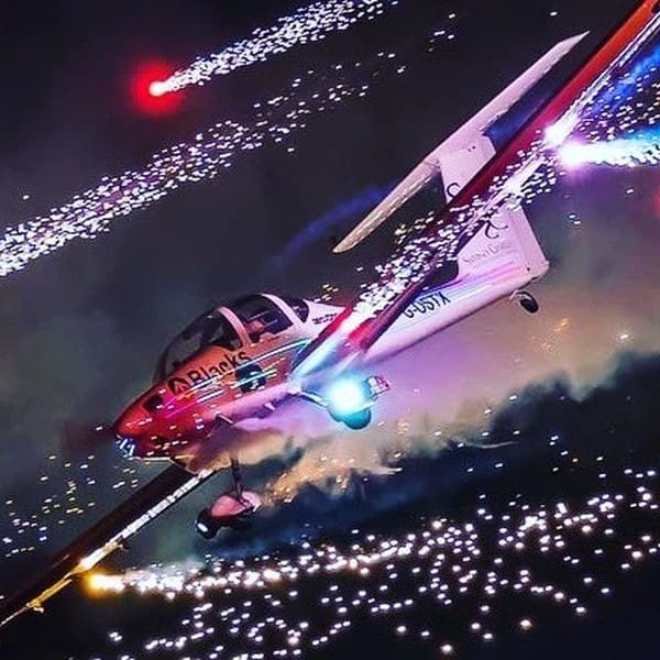 Close up of aeroplane with fireworks