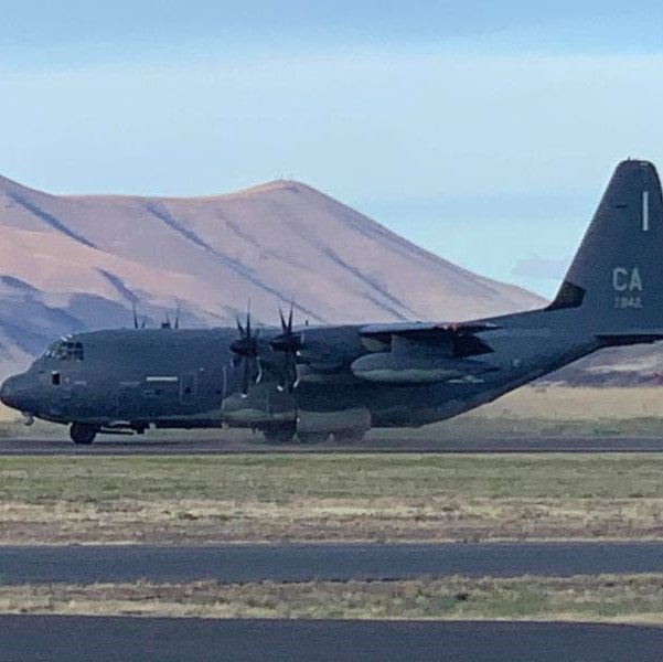 Columbia Gorge Regional Airport C130 Hercules on the runway-min