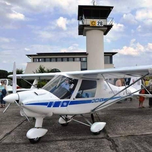 Comco Ikarus plane at airport grounded on tarmac