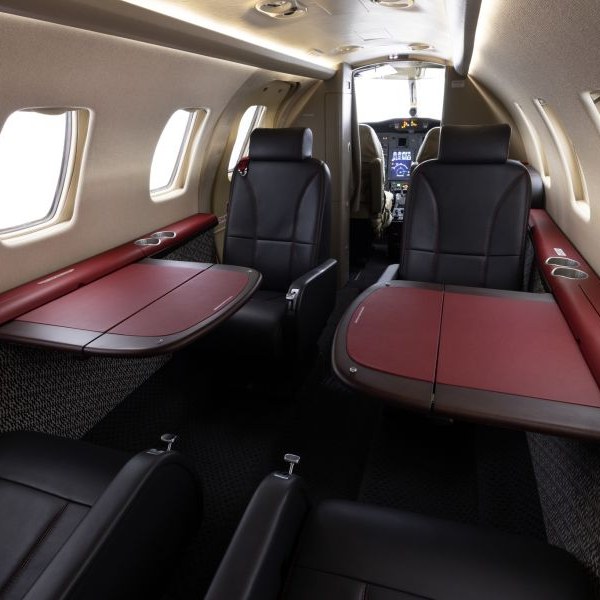 Duncan Aviation Aircraft Sales on AvPay interior of jet aircraft black and red