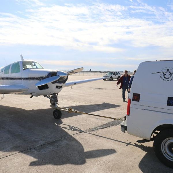 Duncan Aviation FBO Services on AvPay towing airplane