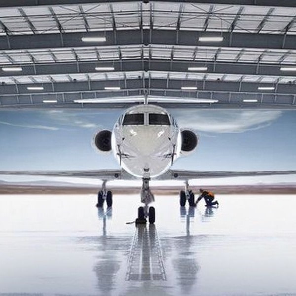 EAC Group jet in hanger nose on