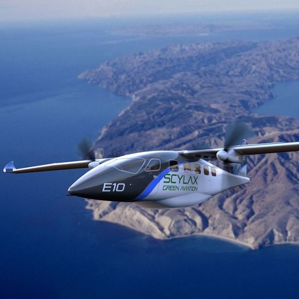 Elektra Solar plane in flight over coast 3