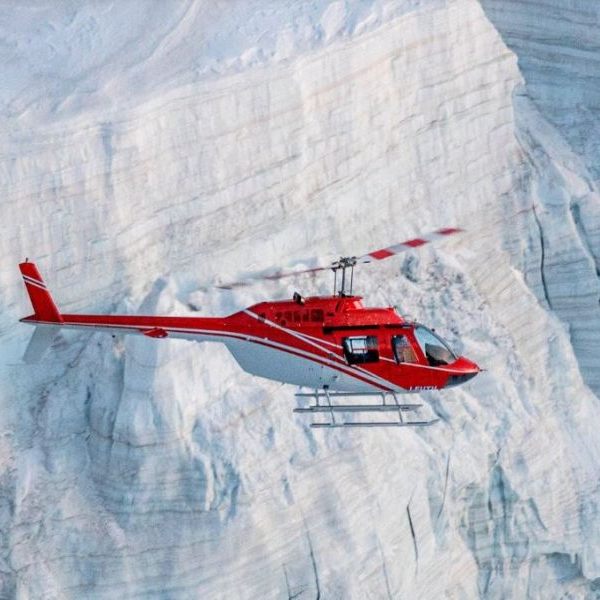 Eurotech Helicopter Services. Engineering. Flying over a glacier