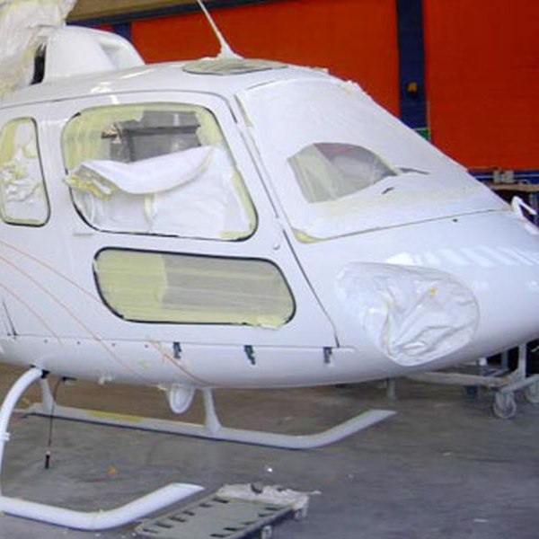Eurotech Helicopter Services. Helicopter being repainted