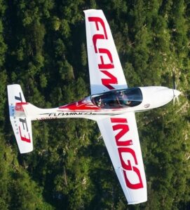 Flamingo Aircraft For Sale From Egmont Aviation On AvPay aircraft exterior in flight above trees